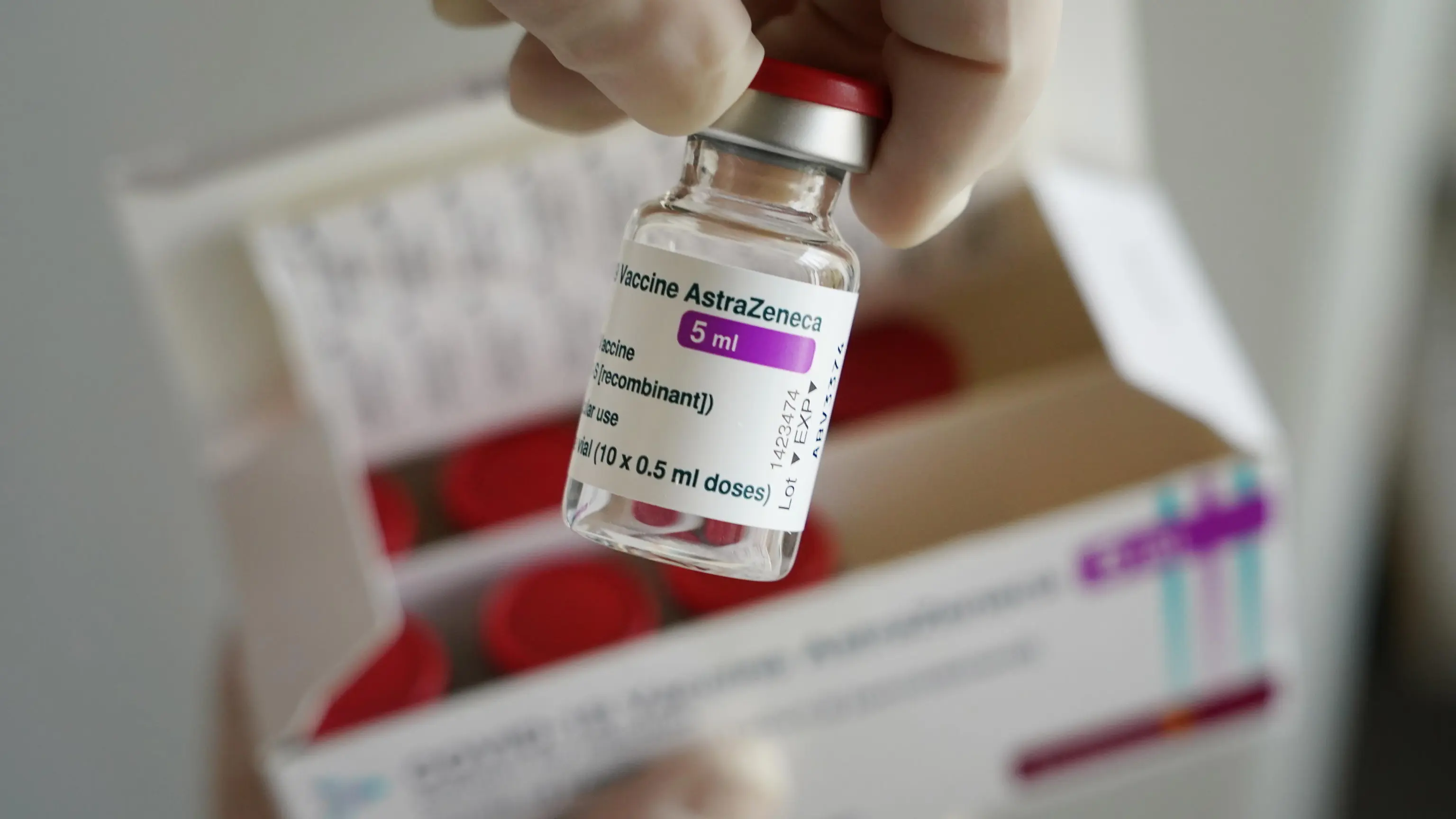epa09048648 A nurse holds a vile of the AstraZeneca vaccine against COVID-19 during the inoculation of patients at a private medical practice as part of a pilot project in the state of Brandenburg during the coronavirus pandemic in Senftenberg, Germany, 03 March 2021. Several German states are allowing vaccinations against COVID-19 to begin in a limited number of private medical practices with the aim of expanding venues that offer the vaccines beyond the current mass vaccination centers. While Germany's vaccination rollout has been hampered by less than anticipated shipments of vaccine, the volume of shipments has begun increasing, leading to higher weekly numbers of vaccinations. EPA/Sean Gallup / POOL