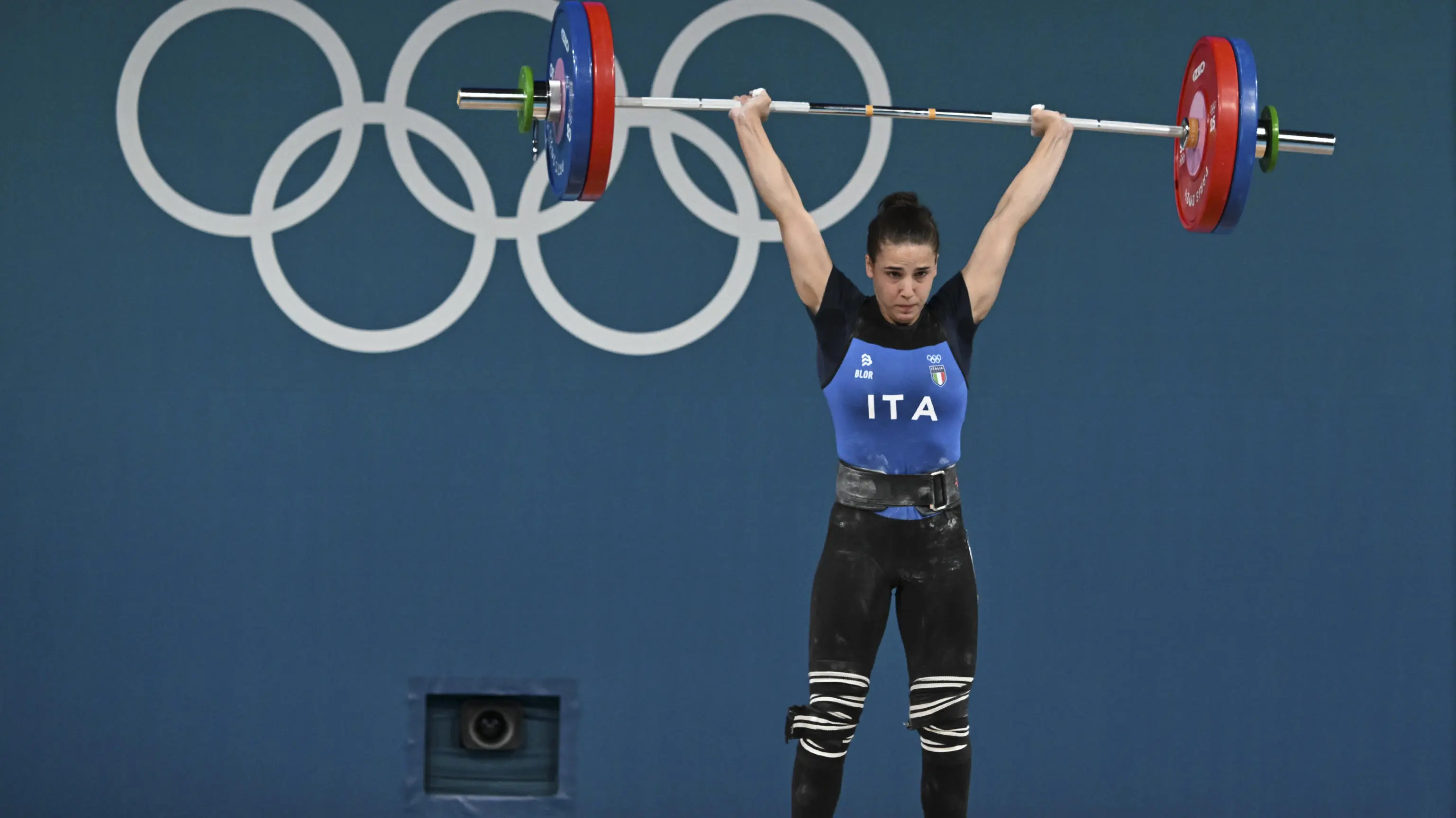 Lucrezia Magistris of Italy competes in the Women 59kg Snatch of the Weightlifting competitions in the Paris 2024 Olympic Games, at the South Paris Arena in Paris, France, 8 August 2024. ANSA/CIRO FUSCO