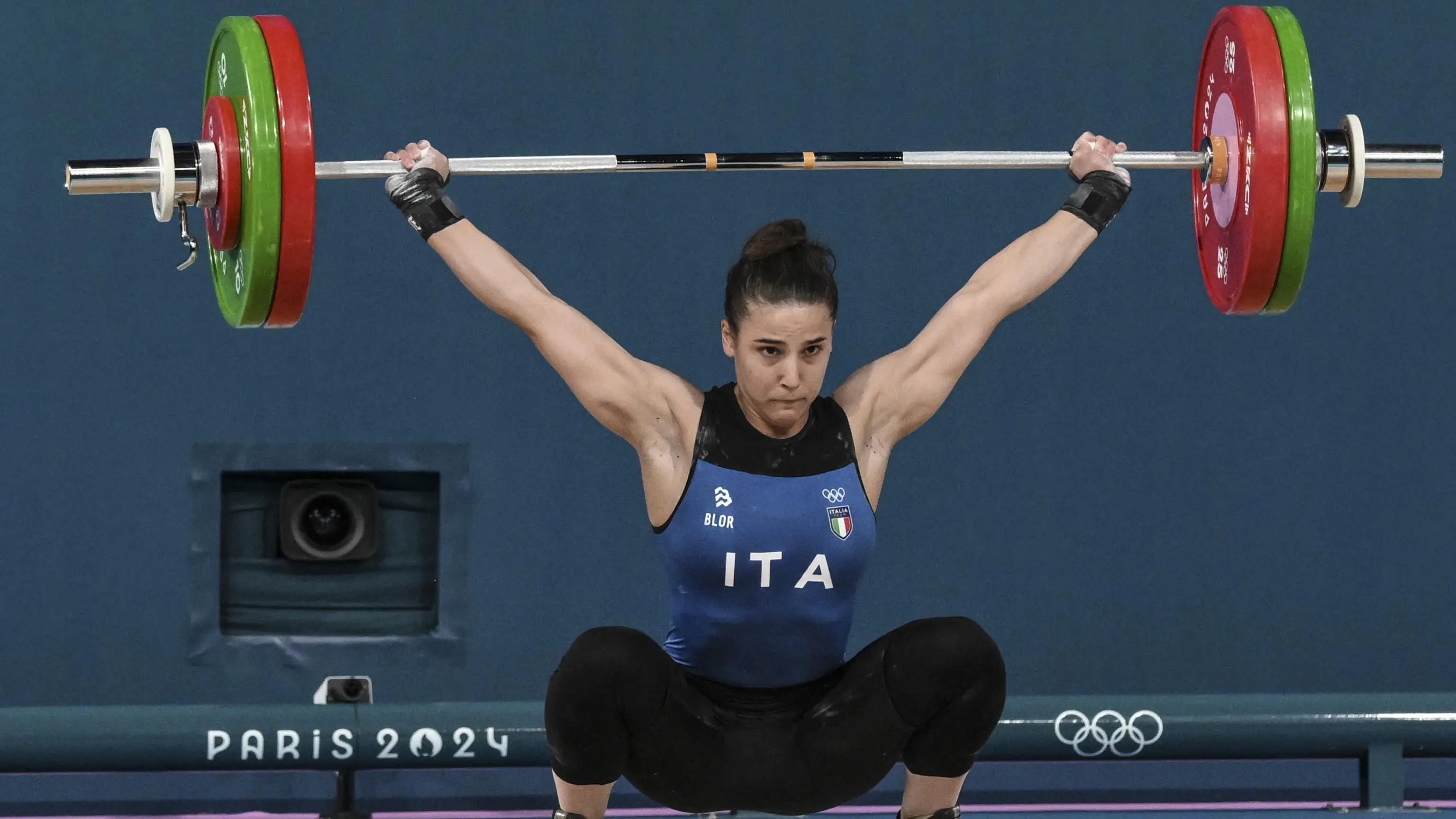 Lucrezia Magistris of Italy competes in the Women 59kg Snatch of the Weightlifting competitions in the Paris 2024 Olympic Games, at the South Paris Arena in Paris, France, 8 August 2024. ANSA/CIRO FUSCO